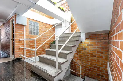 a set of stairs in a brick building at Gran Caribe Hotel in Medellín