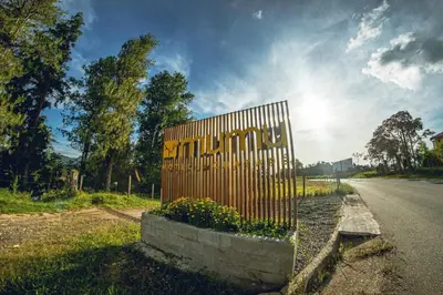 a sign on the side of a road at Mumu by Bernalo Hotels in Guatapé