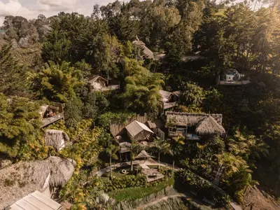 an overhead view of a village in the forest at Atma Villas - Holistic Wellness Experience in Guatapé