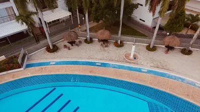 an overhead view of a swimming pool at a hotel at Ciudadela Santa fe Apartasol 4 A 2 in Santa Fe de Antioquia
