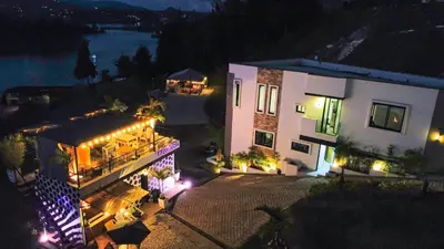 an aerial view of a building at night with lights at Monte Gandolfo in Guatapé