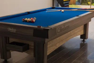 a pool table with billiard balls on it at Hotel Resort Del Cafe in Manizales