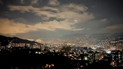 a view of a city at night at Paraíso en la ciudad in Medellín