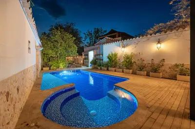 a swimming pool in the backyard of a house at Casa Bixa Hotel Boutique -Santa Fe de Antioquia- Mayores de 12 años in Santa Fe de Antioquia