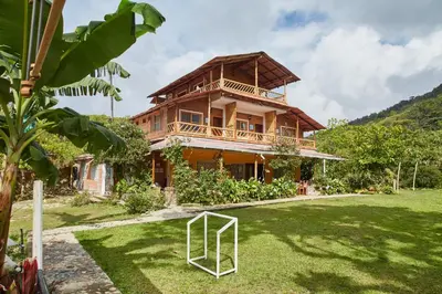 a house with a soccer ball in front of it at Finca Hotel Betel in San Carlos
