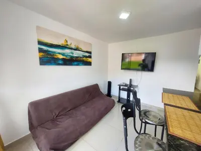 a living room with a couch and a table at Apartamento Boston - Downtown - 2 hab - Wifi in Medellín