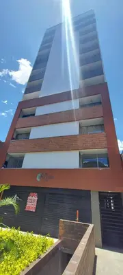 a tall building with the sun shining on it at Apartamento Boston - Downtown - 2 hab - Wifi in Medellín