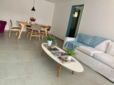 a living room with a couch and a table at Charming apartment in downtown – Home ARIS 301 in Medellín