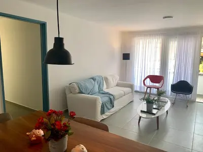 a living room with a couch and a table at Charming apartment in downtown – Home ARIS 301 in Medellín