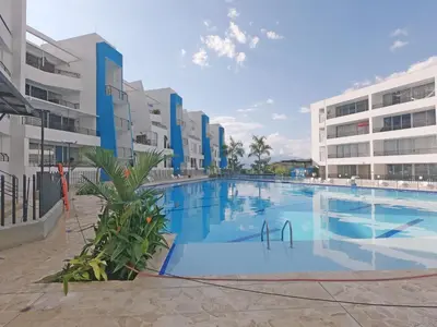 a large swimming pool in front of some buildings at Hermoso Apartamento en San Jerónimo 3 Habitaciones PS121 in San Jerónimo