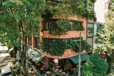 an overhead view of a building with plants at Nomada Hotel Origen in Medellín