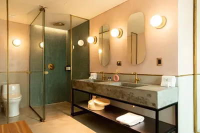 a bathroom with a sink and a shower at 23 Hotel Medellin in Medellín