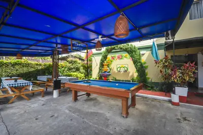 a pool table in the middle of a patio at Finca Hotel Zona Franca in Rionegro
