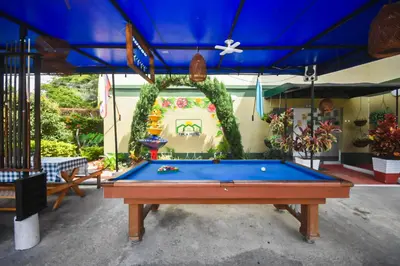 a pool table in the middle of a patio at Finca Hotel Zona Franca in Rionegro