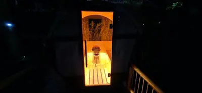 an overhead view of a room with a toilet at night at Glamping Montecarlo Domo Geodesico y Sauna Finlandés Guatapé in Guatapé