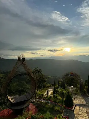 a view of a park with a roller coaster at Entre Verdes Hotel & Glamping in Medellín