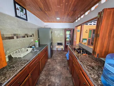 a kitchen with a sink and a counter top at La mejor opción para tu descanso y recreación. in Mariquita
