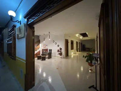a hallway of a building with a room with a hallway at Casa Isabel Hotel in Jardin
