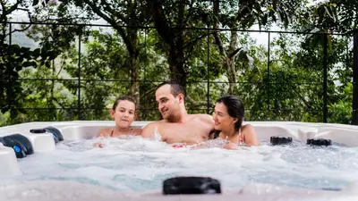 a group of people in a hot tub at Palagua Lodge in San Rafael