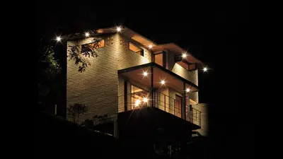 a building with lights on top of it at night at Palagua Lodge in San Rafael