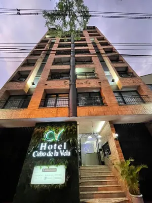 a building with a sign that reads hotel chico usa va vista at Hotel Cabo de la Vela Medellin in Medellín