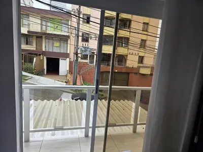 a view of a building from a window at Apartaestudio6 sector Cable Estadio in Manizales
