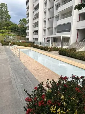 a swimming pool in front of a building at Casitadisol in Santa Fe de Antioquia