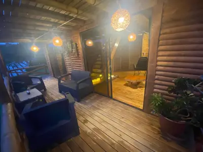 an overhead view of a deck with chairs and a table at Mi lugar secreto in Medellín