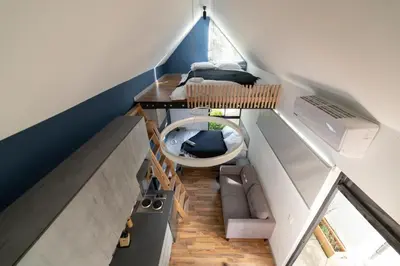 an overhead view of a room in a attic at Moderna casa pequeña en el Poblado MDE A106 in Medellín