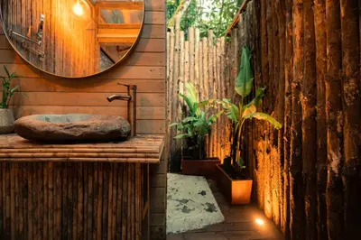 a bathroom with a sink and a mirror on a wall at BubbleSky Glamping Guatapé in Guatapé