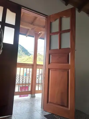 an open door to a room with a view at dulce estancia in Jardin