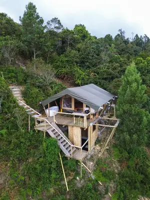 an aerial view of a house with a roof at Skyline Ecoliving Santa Elena in Santa Elena