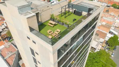 an overhead view of a building with a garden on the roof at Loft 43 in Medellín