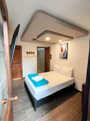 a bedroom with a bed in a room at Apartamento turístico jardín Antioquia in Jardin
