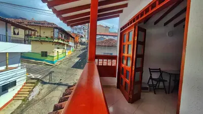 a view of a street from a balcony of a building at Apartamentos con estacionamiento cerca al parque in Támesis