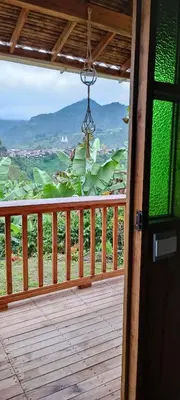 a porch with a view of a mountain at Cabañas Villa Juliana in Jardin
