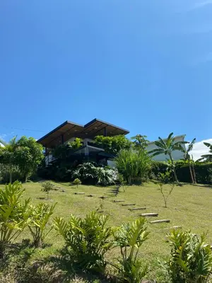 a house in the middle of a field at Verdes Hábitat Glamping in Palestina