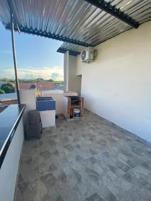 a view of a patio with a roof at Apartamento vacacional Galeon Doradal in Doradal