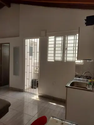 a kitchen with a sink and a counter top at Aparta estudio amoblado 4 Medellín, San Joaquín in Medellín
