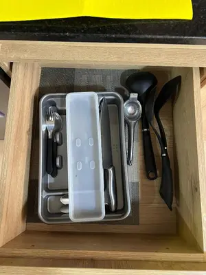 a tray of utensils in a kitchen drawer at Económico alojamiento en Medellín por días - A102 By Roots Rentals in Medellín