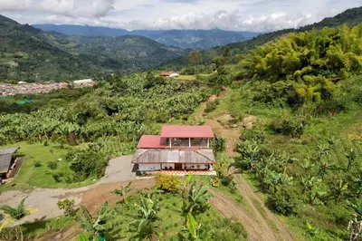 an aerial view of a house on a hill at Casa La Martina disponible en Jardín Antioquia in Jardin