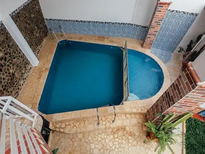 an overhead view of a swimming pool in a house at KasaGrande in Santa Fe de Antioquia