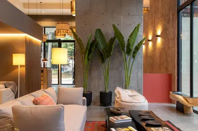 a living room with a couch and a table at Landmark Hotel in Medellín