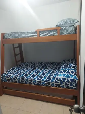 a couple of bunk beds in a room at Apartasol Ciudadela Santa Fé in Santa Fe de Antioquia