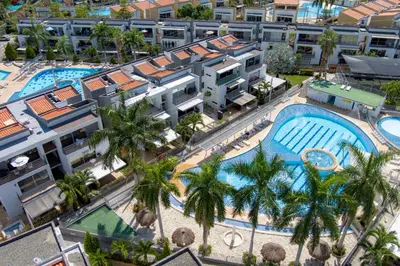 an aerial view of a resort with a swimming pool at Apartasol Ciudadela Santa Fé in Santa Fe de Antioquia