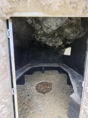 a cave with a pizza inside of it at Glamping Spa & Coffee Tour in Medellín
