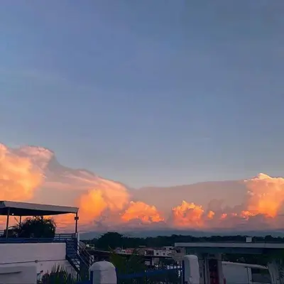 a view of a cloudy sky at sunset at El santorini colombiano en Doradal in Puerto Triunfo