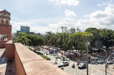 a view of a street with a parking lot at Center City Flats - Apartments in El Poblado near Park Lleras, Medellin! in Medellín