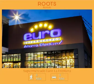 a building with a sign on the side of it at FRN101 Cozy loft located in a popular in Poblado By Roots Rentals in Medellín