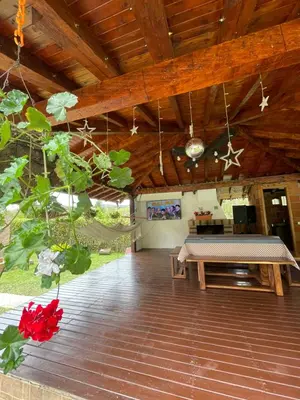 a room with a bed and a bench in it at finca Encanto in Guarne